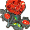 Aplique de flor con pedrería y lentejuelas rojas