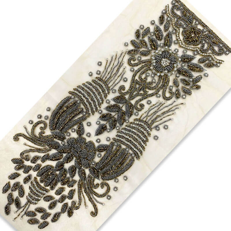 Aplique tipo manga con diseño ornamental