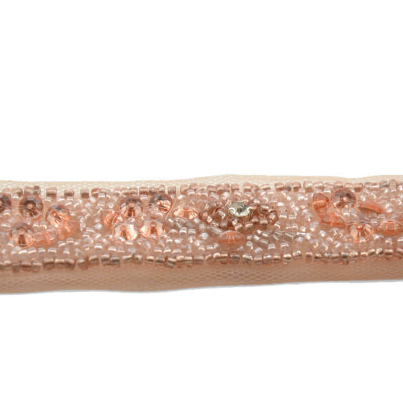 Galón decorativo con brillo en tono salmón