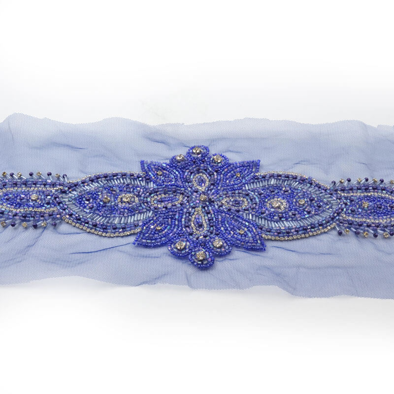Aplique textil con pedrería para cintura