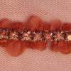 Galón coral con pedrería decorativa
