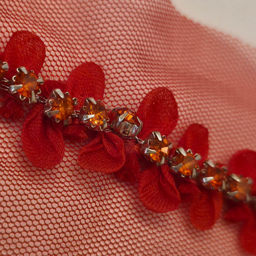 Galón brillante rojo para fiesta