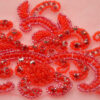 Aplique decorativo en color rojo con cristales