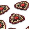 Parche ornamental con piedra roja para moda profesional