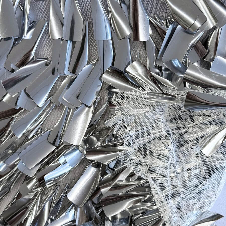 Tejido de lentejuelas campanas plata para carnaval y espectáculo