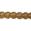 Tira bordada dorada de 9 cm con motivos ornamentales repetidos